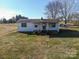 Front view of a ranch style home with a covered porch at 1709 W Highway 27 Hwy, Lincolnton, NC 28092