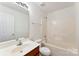 Clean bathroom with a single vanity, tub and shower at 1805 Lexington Ave, Monroe, NC 28112