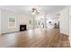 Open living room with a fireplace and kitchen views at 1805 Lexington Ave, Monroe, NC 28112