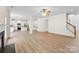 Open living space with hardwood floors and fireplace at 1805 Lexington Ave, Monroe, NC 28112