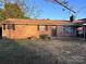 Brick ranch house with a covered entry and a spacious yard at 2040 Ne 25Th St Dr, Hickory, NC 28601