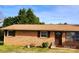 Brick ranch house with a well-maintained lawn at 2040 Ne 25Th St Dr, Hickory, NC 28601