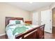 Bedroom with wood flooring, double bed, and closet at 2448 Kensington Station Pkwy, Charlotte, NC 28210