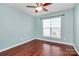 Bright bedroom with hardwood floors and ceiling fan at 2448 Kensington Station Pkwy, Charlotte, NC 28210