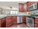 Kitchen with stainless steel appliances and granite countertops at 2448 Kensington Station Pkwy, Charlotte, NC 28210