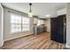 Eat in kitchen with grey cabinets and wood floors at 302 Valley Ave, Clover, SC 29710