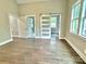 Main bedroom with hardwood floors and access to bathroom at 3535 Katrina Ave, Concord, NC 28025