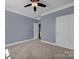 Spacious bedroom with neutral walls, carpeting, and ceiling fan at 3657 Norman View Dr, Sherrills Ford, NC 28673