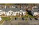 Complex of townhouses from above showcasing ample parking and green space at 3867 Carl Parmer Dr, Harrisburg, NC 28075