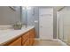 Large bathroom showcasing double vanity, shower, and stylish light fixtures at 412 Cornerstone Dr, Taylorsville, NC 28681