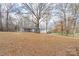 Gray house with mature trees and landscaping at 4477 Pinebrook Dr, Rock Hill, SC 29730