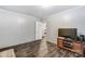 Bright bedroom with wood-look floors and media console at 5211 Timber Creek Ct, Kings Mountain, NC 28086