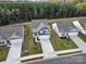 Aerial view of homes with two-car garages and landscaped yards at 654 Lancelot Dr, Richburg, SC 29729