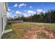 Large backyard with open space and wooden privacy fence at 654 Lancelot Dr, Richburg, SC 29729