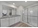 Primary bathroom with granite countertop and walk-in shower at 654 Lancelot Dr, Richburg, SC 29729
