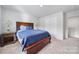 Well-lit bedroom with double door closet and carpeted floor at 654 Lancelot Dr, Richburg, SC 29729