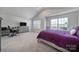 Bright bedroom with a carpeted floor and plenty of natural light at 654 Lancelot Dr, Richburg, SC 29729