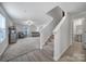Staircase and half bath visible from living room entry at 654 Lancelot Dr, Richburg, SC 29729