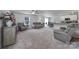 Spacious living room with recessed lighting and neutral carpeting at 654 Lancelot Dr, Richburg, SC 29729