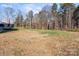 Large backyard with mature trees and open space at 6546 Sherrills Ford Rd, Catawba, NC 28609