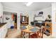 Functional kitchen with white cabinets and access to living room at 806 Alma Ave, Kannapolis, NC 28081