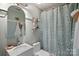 Charming bathroom with updated vanity and patterned shower curtain at 12128 Robins Nest Ln, Charlotte, NC 28269