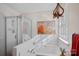 Bathroom features a shower and garden tub with updated fixtures at 12128 Robins Nest Ln, Charlotte, NC 28269