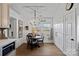 Charming breakfast nook with a round table and view to backyard at 12128 Robins Nest Ln, Charlotte, NC 28269