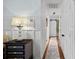 Bright hallway with wainscoting and a stylish runner at 12128 Robins Nest Ln, Charlotte, NC 28269