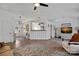 Open concept living room with a view of the kitchen and foyer at 12128 Robins Nest Ln, Charlotte, NC 28269