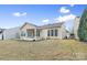 House backyard with patio and grassy area at 15331 Legend Oaks Ct, Fort Mill, SC 29707