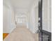 Bright entryway with tile flooring and view into the living room at 15331 Legend Oaks Ct, Fort Mill, SC 29707