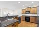 Spacious kitchen featuring granite countertops and hardwood floors at 15331 Legend Oaks Ct, Fort Mill, SC 29707