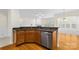 Kitchen with granite island and hardwood floors at 15331 Legend Oaks Ct, Fort Mill, SC 29707