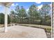 Private patio with checkered tile and treetop views at 15331 Legend Oaks Ct, Fort Mill, SC 29707