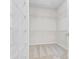Spacious walk-in closet with ample shelving at 15331 Legend Oaks Ct, Fort Mill, SC 29707