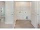 Laundry room with built-in shelving and vinyl flooring at 203 Williams St, York, SC 29745