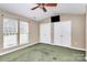 Spacious bedroom with carpet, ceiling fan, and double closets at 2945 Parks Lafferty Rd, Concord, NC 28025