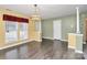 Bright dining room with hardwood floors and neutral walls at 2945 Parks Lafferty Rd, Concord, NC 28025