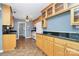 Kitchen offers ample cabinet space, granite counters, and tile floors at 2945 Parks Lafferty Rd, Concord, NC 28025