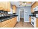 Kitchen features light wood cabinets, granite countertops, and updated appliances at 2945 Parks Lafferty Rd, Concord, NC 28025