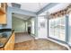 Kitchen with breakfast nook, wood cabinets, and fireplace at 2945 Parks Lafferty Rd, Concord, NC 28025