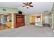 Open living room with views into kitchen and dining areas at 2945 Parks Lafferty Rd, Concord, NC 28025