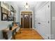 Bright entryway with hardwood floors and coat closet at 404 Yorkfield Dr, Shelby, NC 28150