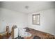 Unfinished bedroom with hardwood floors and a window at 429 Hill St, Statesville, NC 28677