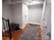 Bright entryway with hardwood floors and coat rack at 555 E Catawba St, Belmont, NC 28120