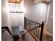 View from above showing the wrought iron railing and hardwood floors at 555 E Catawba St, Belmont, NC 28120