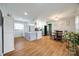 Spacious kitchen and dining area with hardwood floors and ample natural light at 708 N Main St, Lowell, NC 28098