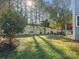 Landscaped backyard with patio and seating area at 9114 Twilight Hill Ct, Charlotte, NC 28277