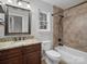 Updated bathroom with granite countertop and tile shower/tub combo at 9114 Twilight Hill Ct, Charlotte, NC 28277